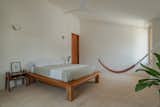 Bedroom in La Posmoderna home renovation by FMT Estudio