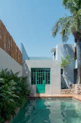 Pool Area of La Posmoderna home renovation by FMT Estudio