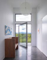 A breezeway through the entrance allows separation between the two sides of the house.