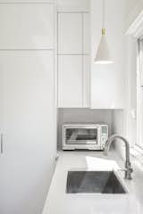 Kitchen and White Cabinet  Photo 4 of 5 in Wilmette Residence Revival by Archisesto