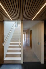 Hallway and Concrete Floor The long and narrow building gets loads of daylight from large windows in both east and west.   Photo 9 of 16 in Lillesteile by Skaara Arkitekter
