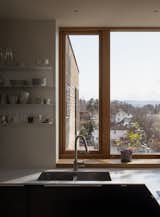 Kitchen, Wood Cabinet, Ceiling Lighting, Laminate Counter, and Undermount Sink Kitchen corner with outlook.  Photo 7 of 16 in Lillesteile by Skaara Arkitekter