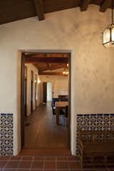 Entry Vestibule to Living Room
 
This is a view to the original living room from the entry vestibule. The handpainted tiles are original and were saved for use in the restoration. The walls are original adobe.Entry Vestibule to Living Room

This is a view to the original living room from the entry vestibule. The handpainted tiles are original and were saved for use in the restoration. The walls are original adobe.