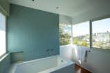 The Hollywood Hills and Silverlake are a panorama viewed from the bathroom windows. From the bathtub itself, the clients see only the Hollywood Sign, the Griffith Park Observatory, the mountains of Griffith Park, and the sky. All signs of the city itself fall below the line of the parapet.