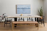 Modern dining table with bench seating.