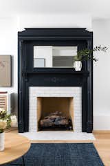Black painted classic Brooklyn fireplace.
