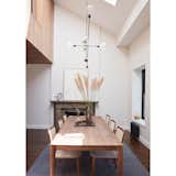 Double height dining space with wood "box" above