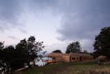 In wild, rugged Patagonia, Chilean architectural firm SAA Arquitectura + Territorio has crafted a comfortable and contemporary home in a notoriously inhospitable environment where access to materials and labor is limited. The exterior is entirely sheathed in shingles made from locally sourced lenga wood, a species native to the Patagonia-Andean forests.