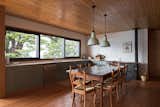 Kitchen, Pendant, Engineered Quartz, Ceiling, Colorful, Undermount, Ceramic Tile, Medium Hardwood, and Dishwasher Local carpenters built the furnishings.  Kitchen Medium Hardwood Colorful Engineered Quartz Pendant Photos from Hats House by SAA arquitectura + territorio