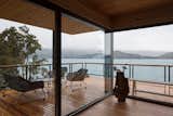 Large decks and walls of glass blur the boundaries between indoor/outdoor living.