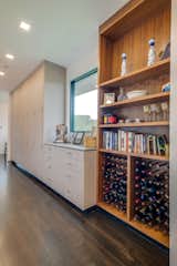 Storage Room, Cabinet Storage Type, and Shelves Storage Type Endless Storage with wine racks  Photo 4 of 11 in Hillside Contemporary on East Valley by Jackson Zeitlin