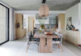 Dining Room, Table, Chair, Pendant Lighting, Storage, and Travertine Floor Dining Room and Kitchen  Photo 4 of 34 in 68 Jonkershoek - nature , water, and material textures feature in this South African home by Mieke Vermaak