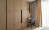 Desk, oblique shelves and bespoke handles inspired by Malevich paintings.
