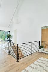 Staircase, Metal Railing, and Wood Tread Foyer  Photo 8 of 36 in The Slate House by Hygge Design+Build