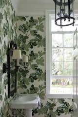 Old Grove downstairs guest bath with secret door.
