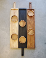 You’ll love the minimalist design and linear profile of this Skinny Charcuterie Ash or French Oak board! These boards are slightly center carved to create a raised wall around the parameter. They are an essential decor piece for home entertaining, buffets, receptions, or your special events.  Available with or without optional bowls. 