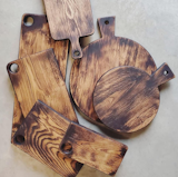 Blackened Series Boards.
Every one of our rustic blackened boards is made from a single piece of seasoned French oak, that’s uniquely hand charred. Once blackened the board is brushed, oiled and waxed with a food grade finish to enhance its natural grain and protect its distinctive deep rich dark colors.
