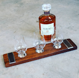 Our very popular Whiskey Flight boards made from barrel oak with embedded steel plates in each end. Shown with optional Glencairn whiskey glasses, which are available to order.
.
Available in 3 and 4 glass serving options.