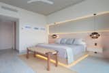 Bedroom, Pendant Lighting, Wall Lighting, Bed, Bench, Night Stands, Accent Lighting, and Ceiling Lighting Master Bedroom  Photo 13 of 15 in ACAPULCO GP APARTMENT by PAIR