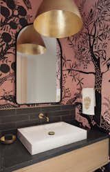 Bath Room, Stone Tile Wall, Granite Counter, Vessel Sink, Ceramic Tile Floor, and Ceiling Lighting Powder room with vibrant pink wallpaper behind raised vanity.  Photo 8 of 15 in 15 Tiny Bathroom Ideas For a Beautiful and Functional Space from Outdoor Mission