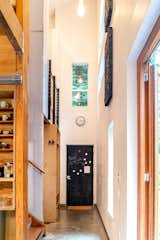 Polished concrete floors with raised concrete base board for easy cleaning.