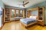 ● Queen-size murphy bed that pulls down into a table
● Surround over bed has overhead lights, book shelves, disappearing night tables
● Two other book shelves
● Ample closet
● Haiku SenseMe caramel bamboo ceiling fan - NEW