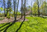 ●Park-like landscape design by Richard Weber of Springhouse Gardens (front yard) and Japanese garden by Andrea Wilson Mueller of Inside Out Design (backyard)
●Interior yard has stone and wood benches, numerous planting areas, grass and rock walls and other rock formations
●Owner planted 10-12 thousand daffodils, irises, and grape hyacinths as well as other deer-resistant bulbs
●Wildlife abounds -deer, racoons, blue heron, wild turkeys, rabbits, chipmunks, squirrels