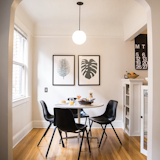 Dining Room, Pendant Lighting, Table, Chair, and Medium Hardwood Floor  Schoolhouse Luna Cord Pendant With 10" Shade from Schoolhouse’s Affordable Globe Pendant Is at Once Retro and Modern