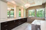 Bath Room, Ceiling Lighting, Pendant Lighting, Marble Counter, and Freestanding Tub Master Bathroom  Photo 16 of 19 in The Bridges House by Virginia Pizzi