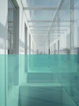 The top floor removed part of the original solid wall and replaced it with a glass curtain wall to provide sufficient light for the interior space