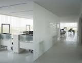 Frosted glass provides a certain privacy for the office space, while the large glass curtain wall provides a good view and lighting for the space