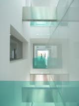 we used green glass as the armrest in the corridor where the function box is connected to the virtual body (atrium). Green is also the brand color of the client
