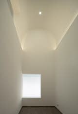 The two-storey height of the reception room brings a special sense of ritual to the space.