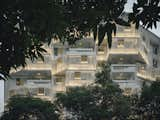 Lighted apartment building at dusk