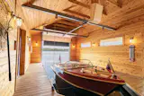 Cedar-clad boathouse, home to an Elitecraft Riviera.
