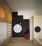 Kids Room, Bench, Storage, Bed, Bedroom Room Type, Playroom Room Type, Dresser, Night Stands, Toddler Age, Light Hardwood Floor, Neutral Gender, and Chair  Photo 12 of 18 in The Toy Box by Estudio ji Architects