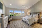 The en-suite master bedroom enjoys epic views
