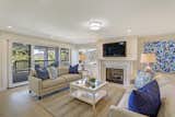 The lower level family room is the perfect place to relax and gather