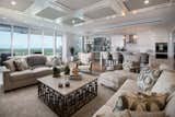 This luxurious condo is designed to provide opportunities for capturing waterfront views from living or dining spaces.  A custom ceiling design offers a tremendous point of interest from top to bottom.  