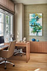 Office, Desk, Study Room Type, Light Hardwood Floor, Storage, and Chair A home office is casually elegant bathed in coastal sunlight. 
  Photo 7 of 7 in Coastal Elegance - Casual Lifestyle - Elegant Style  - Wilmington, NC Second Home by Laurie Rudd