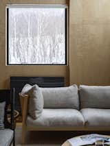 Living Room and Sofa Detail view of window looking out into the snow  Photo 8 of 10 in Foxwood by Tomoyuki Sudo
