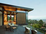 One of the most notable aspect of the living space is a heavy metal gear and chain pivoting window, not only an opulent gesture that complements the interior objects but also another clever emphasis on the idea of everchanging interweaving space. The pivoting window opens to the east terrace and a secondary dining room and allowing the visitor to zigzag down to the pool and lower guest rooms.