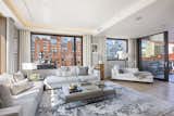 A wall of sliding glass doors off the living room lead to a generous northern terrace for BBQs, al fresco dining and summer cocktail parties.