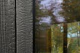 Exterior, House Building Type, Metal Roof Material, and Wood Siding Material New England Forest House featuring yakisugi (shou sugi ban) japanese charred wood siding  Photo 4 of 9 in New England Forest House by Nakamoto Forestry