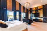 OK, now we are talking, a uniquely designed for someone who desire power and fame! 16' ceiling height, you can play basketball in this bedroom!
