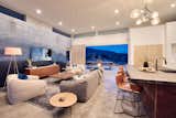 Concrete Floor, Coffee Tables, Console Tables, Ceiling Lighting, and End Tables Main living and kitchen   Photo 14 of 23 in SkyHouse Joshua Tree by John Davis