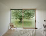Sheffield residence by Vincent Appel / Of Possible bedroom with floor to ceiling window