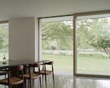 Sheffield residence by Vincent Appel / Of Possible dining room with floor to ceiling windows
