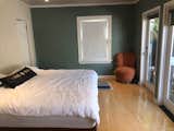 Before: The bedroom lacked personality and functioned essentially as a walk-through space to get to the backyard.  Photo 2 of 14 in Rental Revamp: A Comedian’s L.A. Digs Get a Plush, Boudoir Treatment