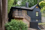 After: The home is a duplex, with a walk-out basement, and the doors are stacked on top of each other.